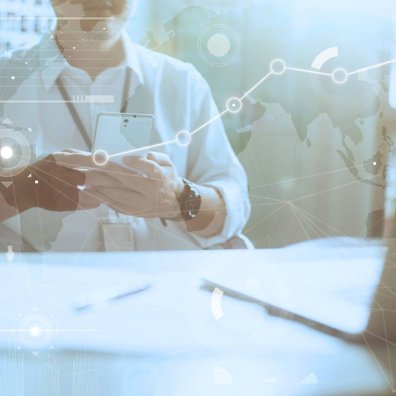 a doctor is sitting at a desk with a laptop a doctor is sitting at a desk with a laptop